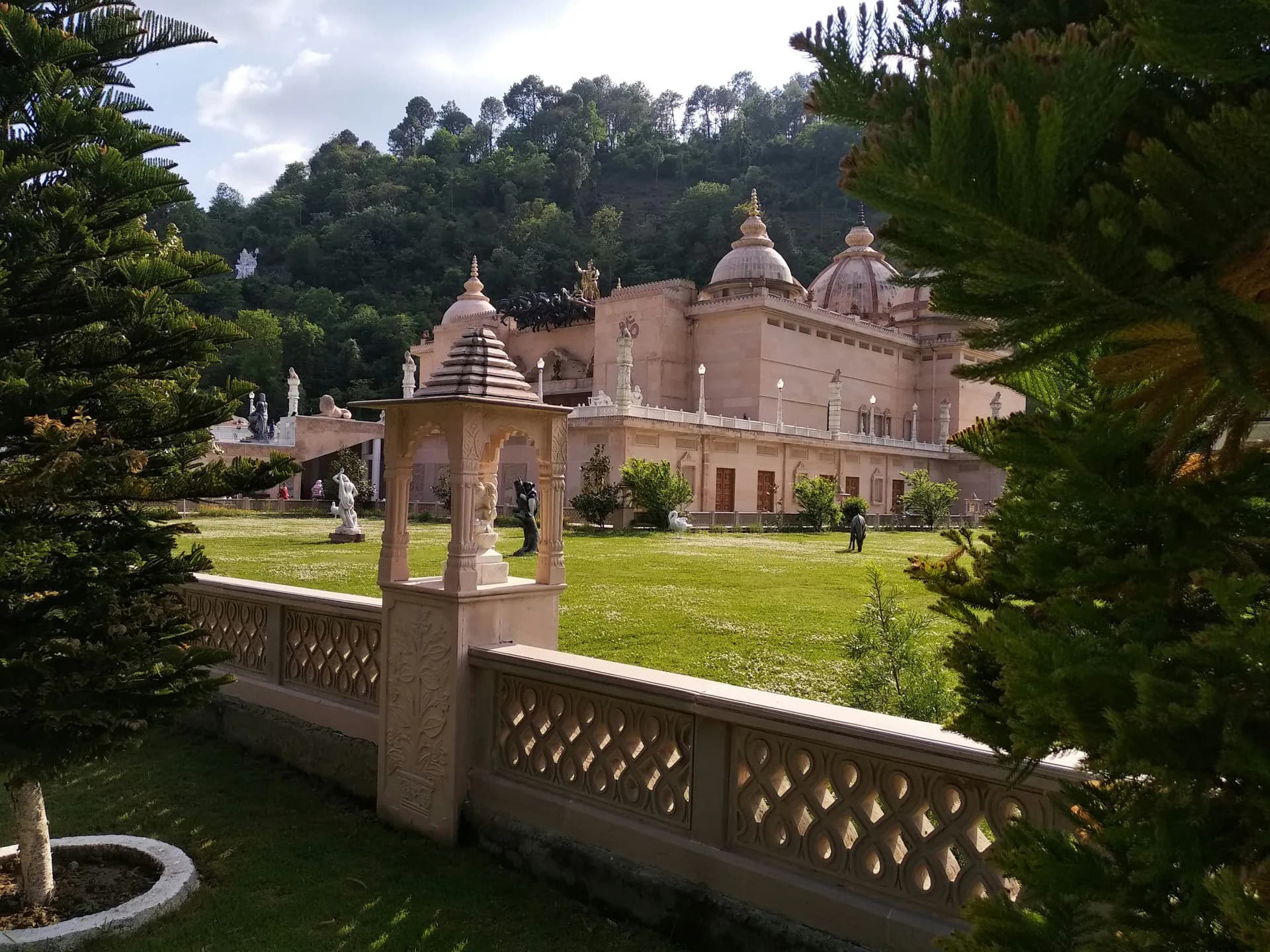 Elaborate traditional temple architecture and stone carvings at Mohan Heritage Park in Solan