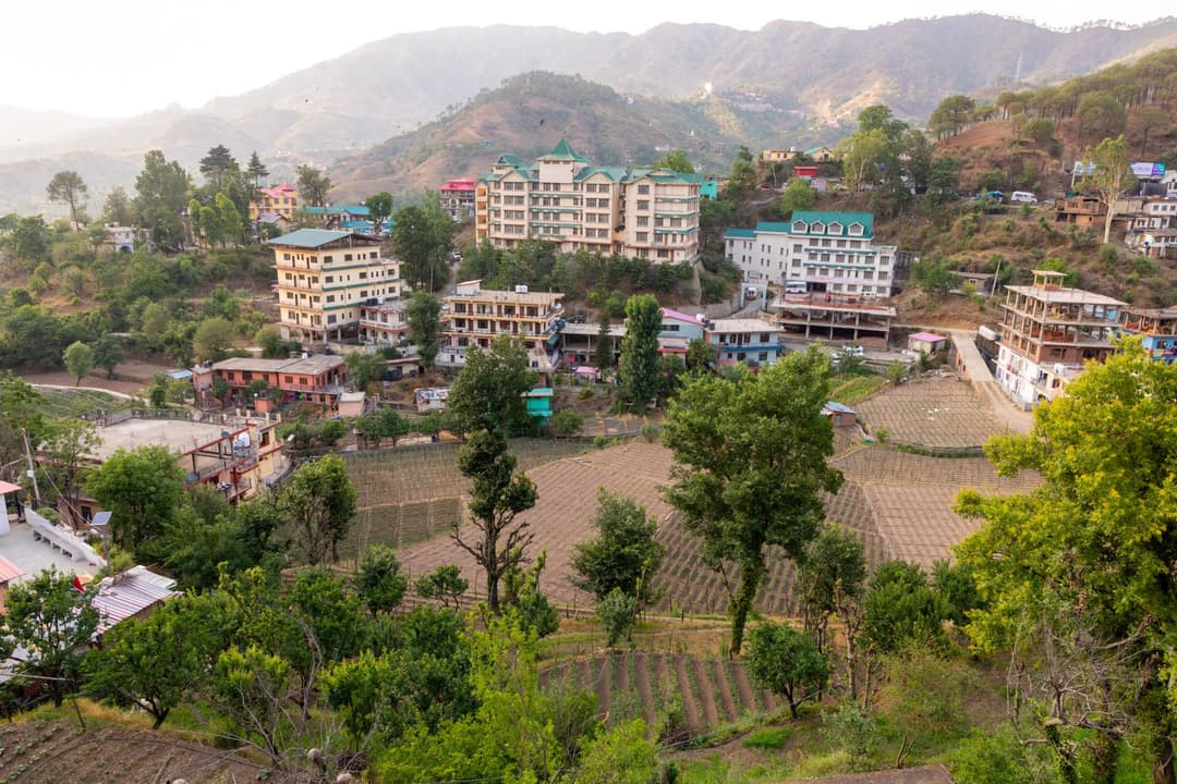 Scenic landscape of peaceful Kandaghat, a perfect base for exploring Shimla and Chail